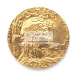 A 21k gold replica of the 1900 Paris Exposition Universelle Internationale medal designed by