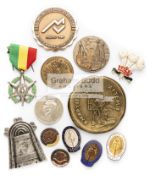 A miscellany of sporting medals and badges,