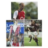 Three signed colour photographs of Arsenal's Dennis Bergkamp