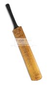 A cricket bat signed to the front by 17 members of the India 1959 touring team to England,