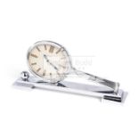 A chrome Tennis Racket 8 day Desk Clock,