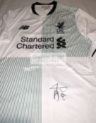 A group of four signed Liverpool FC replica jerseys,