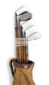 A matched set of five Firth stainless hickory shafted irons, comprising Aston driving iron,
