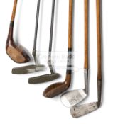 Six golf clubs, comprising: a William Park original bent neck patent putter,