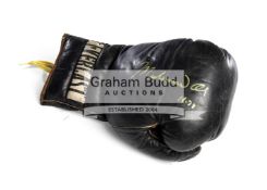 An autographed Muhammad Ali Deer Lake training boxing glove dated 1978,