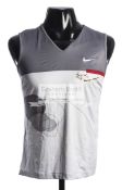 An autographed Nike tennis tank top, signed by Lindsay Davenport, the grey,