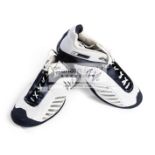 An autographed pair of Reebok DMX Flow-Pak tennis shoes, signed by Andy Roddic,