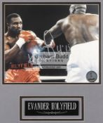 Two Evander Holyfield signed photographic presentations, both with colour 8 x 10 in.