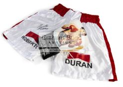 Roberto Duran signed boxing glove and trunks,