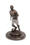 A complete set of three Heredities Manchester United bronzed figures of Roy Keane,