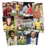 A collection of autographed football magazine/book plates and cuttings, packed with approx.