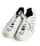 An autographed pair of Yonex Ergoshape Tennis shoes, signed by Monica Seles,