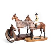 A Beswick Arkle with Pat Taaffe up figural group, a Beswick Arkle model and a Arkle head,