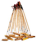 A collection of fourteen vintage polo sticks, makers including Salter & Son (Aldershot); T.P.