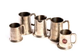 A group of five pewter polo tankards,