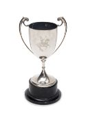 An English silver polo trophy.