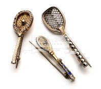 Three 9ct gold Victorian tennis racquet brooches comprising one with seed pearls on the handle,