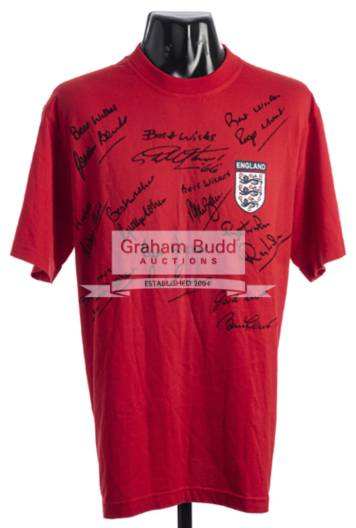 A 1966 team-signed red England replica t-shirt,