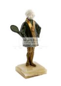 A rare French Art Deco patinated and gilt bronze ivorine figure of a lady tennis player,