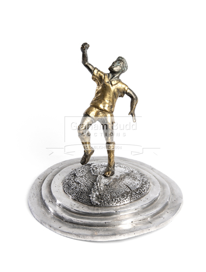 A bronze sculpture of Pele, with one fist raised in the classic post-goal celebratory pose, - Image 2 of 2