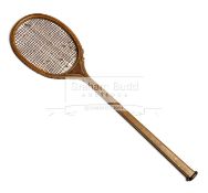 A racquet for the game of Longue Paume, the outdoor version of Jeu de Paume,
