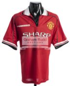 A red Manchester United FC replica 1998/99 treble season jersey,