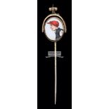 A gold & intaglio reversible stick pin of the jockey Fred Archer,