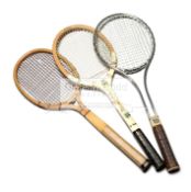 A collection of seven tennis racquets,