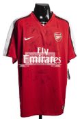 Team-signed Arsenal replica home jersey c2009, 19 signatures in black marker including Eboue,