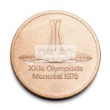 Montreal 1976 Olympic Games participation medal, designed by G Huel & P Pelletier, in copper,