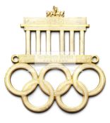 Three Olympic Games commemorative car grille badges, the first a Los Angeles 1932,
