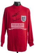 An England 1966 World Cup final replica jersey signed by the goal scorers Geoff Hurst and Martin