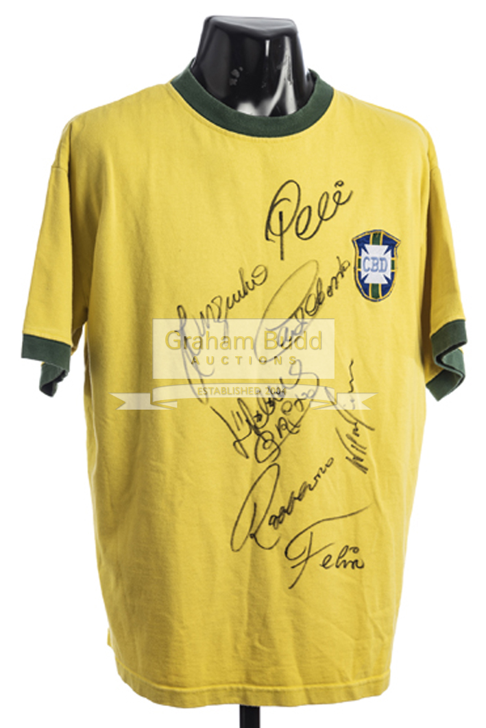 A signed 1970 Brazil yellow replica jersey, signed in black marker pen featuring Pele,