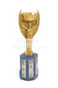 A superb 1950 solid brass full-sized replica of the Jules Rimet trophy,