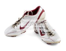 Theo Walcott signed pair of football boots, the white and red Nike size 10 UK boots,