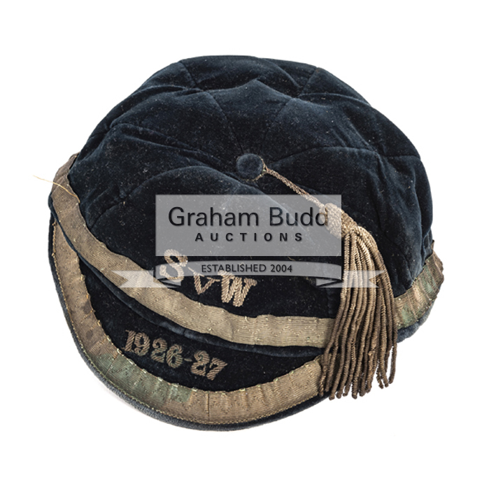 A blue football cap inscribed SvW 1926-27,