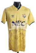 A team-signed Everton FC yellow away un-numbered jersey season 1986-87,