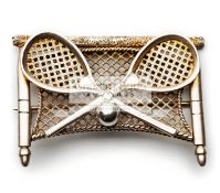 A rare Victorian tennis brooch in silver-gilt,