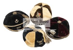 A collection of four miscellaneous sporting caps dating between 1911 and 1934,