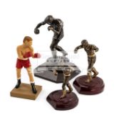 A group of four boxing figurines, three in metalware, the largest 25.