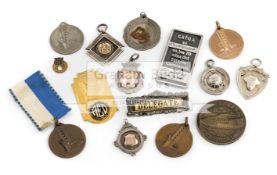 Collection of 17 medals and badges including World Cup issues,