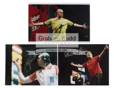 Twelve signed photographs of international darts players, Comprising a mix of 12 by 8in.