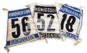 A trio of numbered competitors' tabards associated with Austrian Josef Feistmantl,
