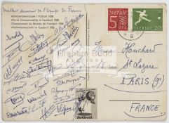 A 1958 World Cup postcard, signed by the France International football team,