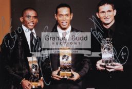 Triple-signed colour photograph of the 2005 World Footballers of the Year holding their awards,