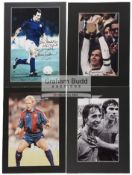 A group of four mounted photographs signed by Interntaional footballers,