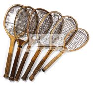 A collection of six early wooden tennis racquets, comprising "The Invincible" fan tail racquet by T.