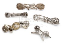 Five Victorian silver tennis brooches comprising three double racquet brooches;