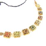 A Mughal style yellow gold multi-gem Navaratna Indian necklace.