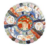 A large Japanese Imari charger, Meiji period (1868 - 1912).